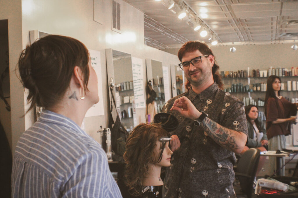 Amber checks in with Scott while he diffuses his mannequin for texture.